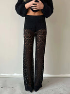 Woman wearing the Valentina Luxe Kanten Broek with elegant lace details and a comfortable fit, ideal for adding style to any look.